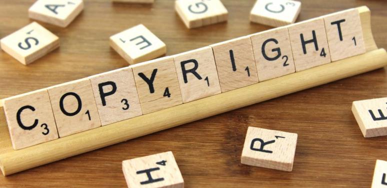 game pieces spelling out the word 'copyright'
