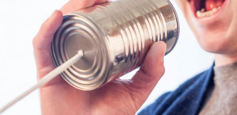 talking into a can