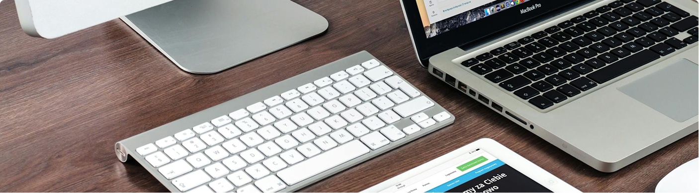 various computers and assets on a desk