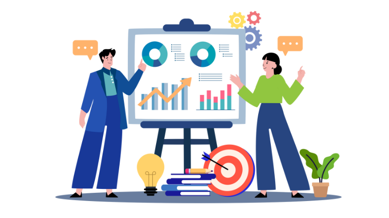 Two people stand in front of data graphics